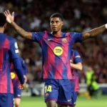Marcus Rashford celebrando su primer gol ante Olympiakos