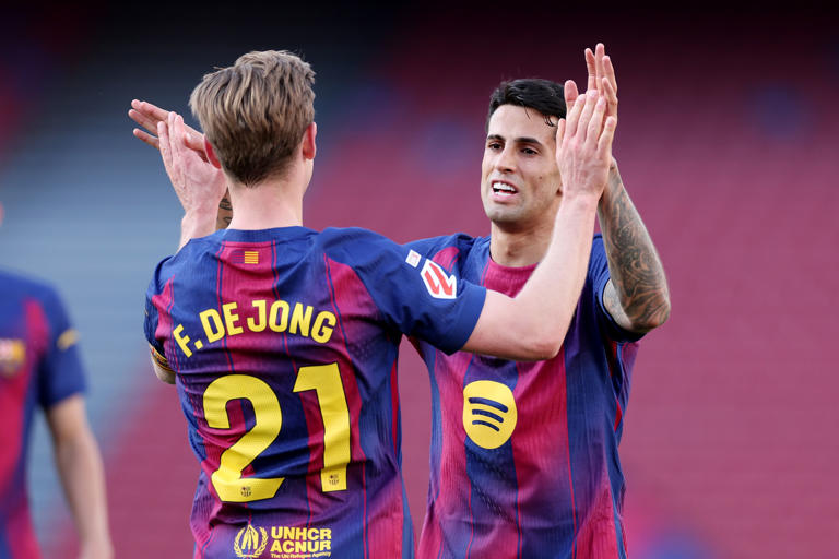 Joao Cancelo y Frenkie De Jong