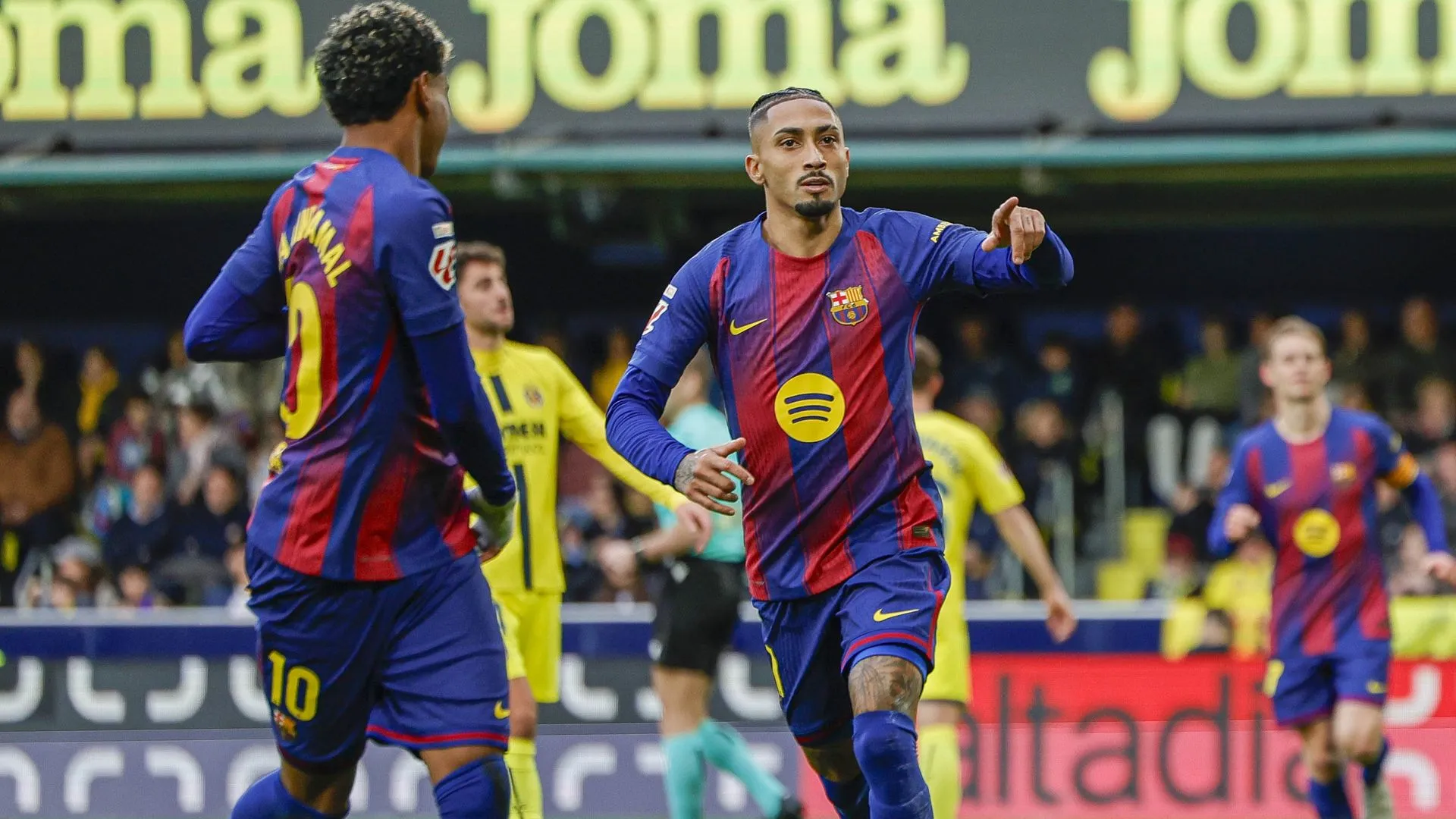 Raphinha y Lamine Yamal